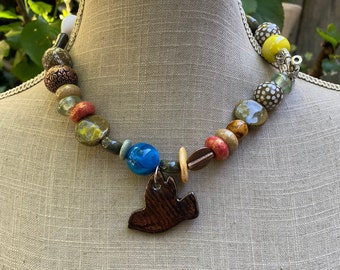 Colorful rustic ethnic necklace large ceramic beads silver and copper metal plexiglass cabochon ceramic flower "Envol"