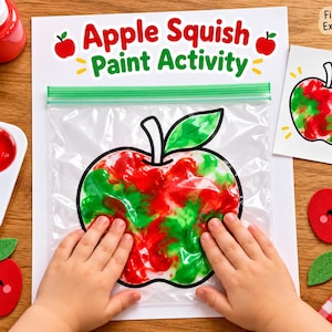 May include: An Apple Squish Paint Activity kit featuring a clear plastic bag with a printed apple outline filled with red and green paint. Includes a white instruction sheet, red and green paint pots, a palette, and felt apple cutouts.