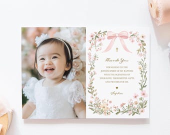May include: A thank you card with a floral border and a pink bow. The card has a photo of a baby girl in a white dress and the text "Thank You for adding to the joyous spirit of my baptism with the blessings of your love, thoughtful gifts and prayers for me. Sophia".
