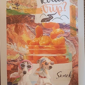 May include: A collage art print featuring the text Road Trip? and Snacks. The image displays two dogs wearing headscarves and sunglasses, positioned in front of a glass jar filled with orange snacks, set against a textured desert landscape.