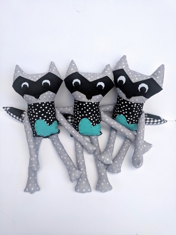 Black and Gray Raccoon Stuffed Animal with Striped Tail and Aqua Hand-stitched Heart