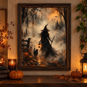 May include: A framed wall art print depicting a silhouette of a witch in a pointed hat holding a lantern, walking through a misty autumn forest with a black cat. The scene features orange pumpkins, falling leaves, a full moon, and a distant castle.