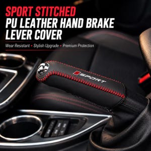 May include: A black PU leather hand brake lever cover featuring red stitching along the edges and a chrome-coloured tip. The cover displays the text SPORT in white letters with a small red square logo on the side of the black leather surface.