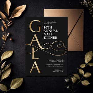 May include: A black rectangular invitation card with gold lettering reading 10TH ANNUAL GALA DINNER, featuring a large vertical GALA text and elegant gold flourishes. The card includes event details and is paired with a matching gold envelope.