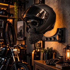 May include: A matte black motorcycle helmet mounted on a wall-attached display stand shaped like a human skull with a detailed beard. The helmet features a clear visor and is positioned to showcase the skull sculpture underneath the helmet shell.