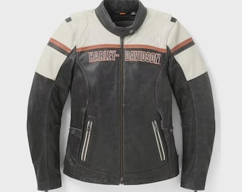 May include: A black and off-white leather motorcycle jacket featuring a mandarin collar, a full-length front zipper, and two zippered hand pockets. The chest displays the text Harley-Davidson in orange lettering with a horizontal orange stripe.
