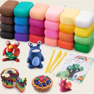 May include: A set of colourful modelling clay blocks stacked in rows, accompanied by three yellow plastic sculpting tools, a user manual, and several clay figures including a red monster, a blue creature, a rainbow cake, a berry pie, and a snail.