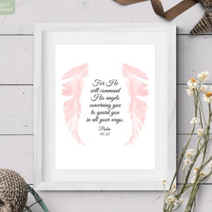May include: A white framed print with a pink watercolor angel wing design. The print features the text "For He will command His angels concerning you to guard you in all your ways. Psalm 91:11".