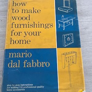 May include: A vintage book titled "How to Make Wood Furnishings for Your Home" by Mario Dal Fabbro. The cover is divided into yellow and blue sections with illustrations of furniture. The book promises step-by-step instructions for making 110 home accessories.