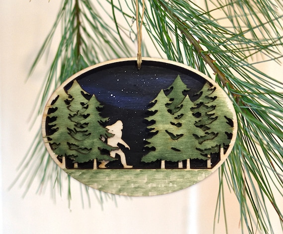 Sasquatch walking his dog - Cedar Ornament Sasquatch walking his dog - Cedar Ornament