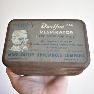 May include: A set of three ceramic mugs with a speckled, matte finish. Each mug features a different color: light blue, cream, and gray. The mugs have a simple, modern design and a comfortable handle. Perfect for coffee or tea.