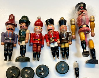 5 Vintage wooden soldiers and 1 nutcracker, hand painted, SOLD AS IS