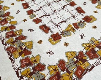 Vintage abstract tablecloth, 1970s design in rust and gold