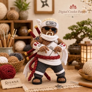 May include: A crochet doll of a character with dark skin, a blonde mohawk, and a white headband with a metal-like plate. The doll wears a white scarf, a white sleeveless top, dark gray pants, and carries three red swords on its back.