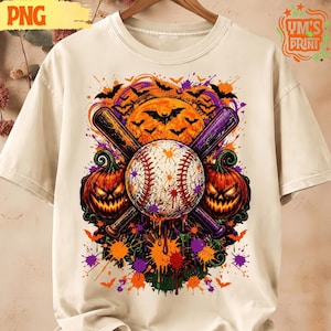 May include: A cream-colored t-shirt featuring a graphic print of a baseball centered over two crossed baseball bats. Two jack-o'-lanterns sit at the base, surrounded by a full moon, flying bats, and vibrant orange and purple paint splatters.