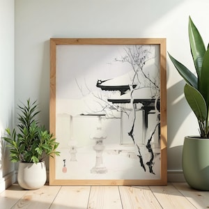 Peut inclure: Une peinture à l'encre encadrée dans un cadre en bois clair représentant une cour de temple japonais enneigée avec des lanternes en pierre, des branches d'arbres dénudées et une architecture de toit traditionnelle, avec un sceau rouge.