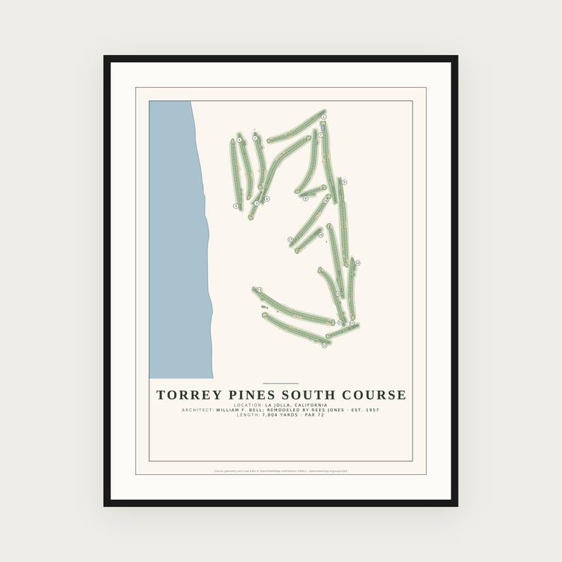 May include: A framed print of the Torrey Pines South Course map featuring a light blue coastline, green fairways, and black text detailing the location in La Jolla, California, the architects William F. Bell and Rees Jones, and 7,804 yards.