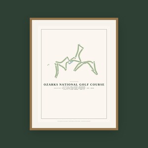 May include: A framed print of the Ozarks National Golf Course layout, featuring a green course map on a cream background. Text includes the course name, location in Hollister, Missouri, architects Bill Coore and Ben Crenshaw, 2019 est., and 7,036 yards par 71.
