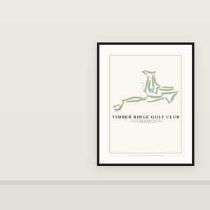May include: A framed print of the Timber Ridge Golf Club course layout, featuring green fairways and blue water hazards on a cream background. The text includes the club name, location, architect, establishment year, 6,620 yards, and par 72.
