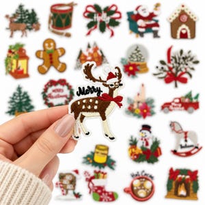 May include: A collection of embroidered Christmas-themed patches featuring various holiday icons including a reindeer with a red bow and the word Merry, a gingerbread man, Santa Claus, a snowman, a gingerbread house, and a red truck with a tree.