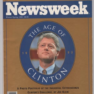 May include: Newsweek magazine cover featuring a portrait of Bill Clinton within a blue circle, with the text "THE AGE OF CLINTON" and the years "1993." The cover has a gold background and includes the text "COMMEMORATIVE ISSUE."
