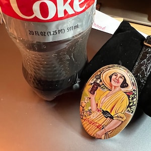 Coca Cola advertising tin box
