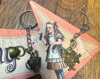 keychains with Alice in Wonderland theme