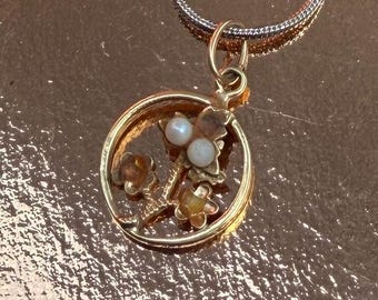 Circle around a pearl flower necklace with 10” 14k goldplated chain.