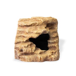 May include: A tan and brown rock-shaped hideout with a textured, craggy surface and a large, irregular opening on the front. The structure features layered, stone-like details and a deep, dark hollow interior space for small animals.