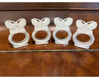 4 vintage witte keramische servethouders in de vorm van vlinders