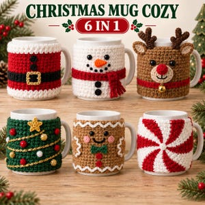 May include: Six white ceramic mugs featuring crocheted Christmas-themed cozies. Designs include a Santa suit, a snowman, a reindeer with antlers, a decorated Christmas tree, a gingerbread person, and a red and white peppermint swirl pattern.