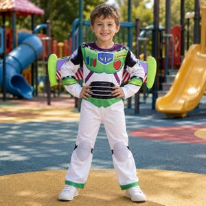 May include: A Buzz Lightyear costume featuring a white jumpsuit with green and purple accents, a chest plate with printed buttons, a Space Ranger logo, and the text Lightyear, complete with attached foam wings and knee pads on the legs.