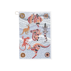 May include: A rectangular towel featuring a light blue background with white wavy lines and dots. The design includes a map of Australia, a kangaroo, a koala, a crocodile, and a lizard, all decorated with orange, red, and black patterns.