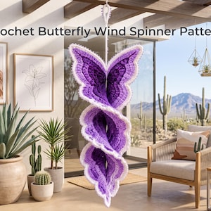 May include: A purple and white crochet butterfly wind spinner hanging vertically. The design features layered, spiraling butterfly wing shapes with a white scalloped edge. The text "Crochet Butterfly Wind Spinner Pattern," is visible at the top.