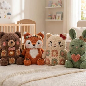 May include: Four plush stuffed animals sitting in a row. A brown bear with a granny square chest, a fox with a floral crown, a cream cat with a red bow and granny square body, and a green rabbit holding a pink heart. All have textured yarn.