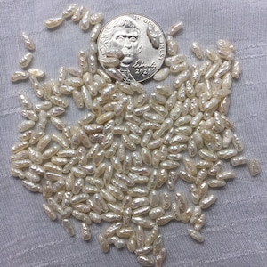 Vintage Japanese Rice Pearls: High Luster, Off White (50 Carats)