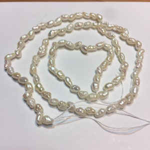 Rice Pearls. 15.75&quot; strand. 3 x 5mm. High Luster.