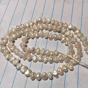 Pearls from Japan. 15.9&quot; strand. Side drilled. Freshwater.