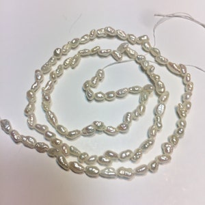Rice Pearls. 16” strand. 3 x 5.5mm