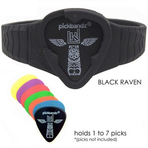 May include: Black silicone guitar pick holder bracelet with a pickbandz logo and the words "BLACK RAVEN". The bracelet holds up to 7 guitar picks.  *(picks not included)*