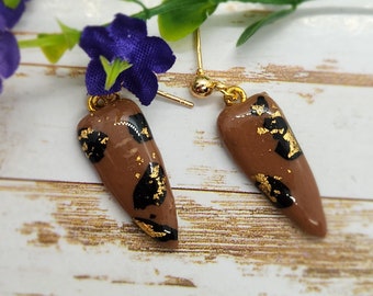 Dagger shaped clay leopard print earrings