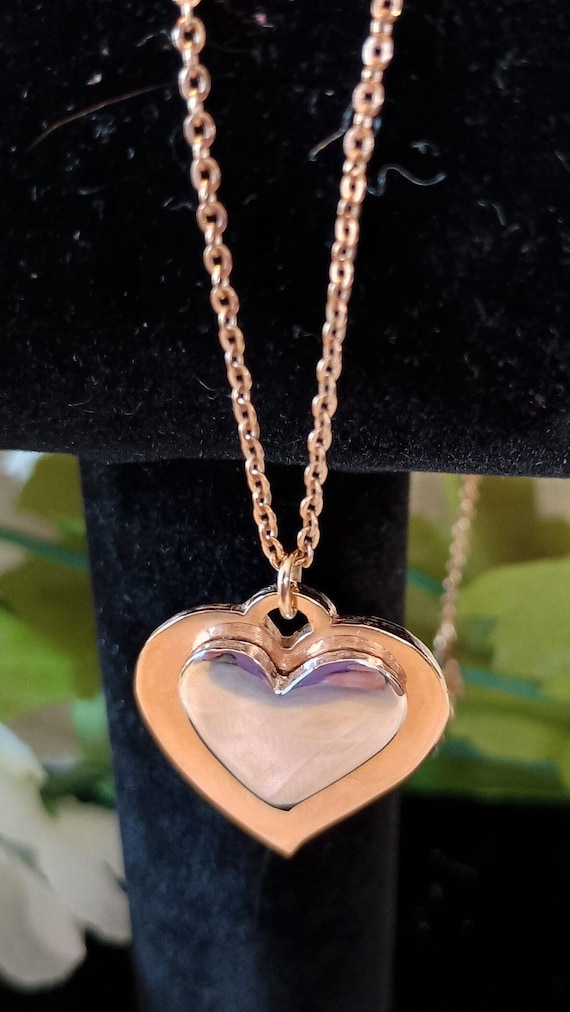 Artistry two tone heart pendant necklace
