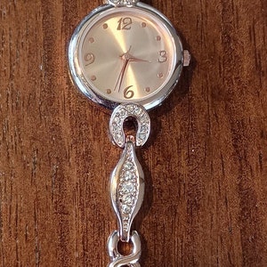 rose gold colored rhinestone watch