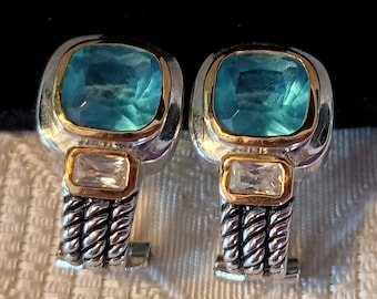 Silver tone earring with aqua/blue stone