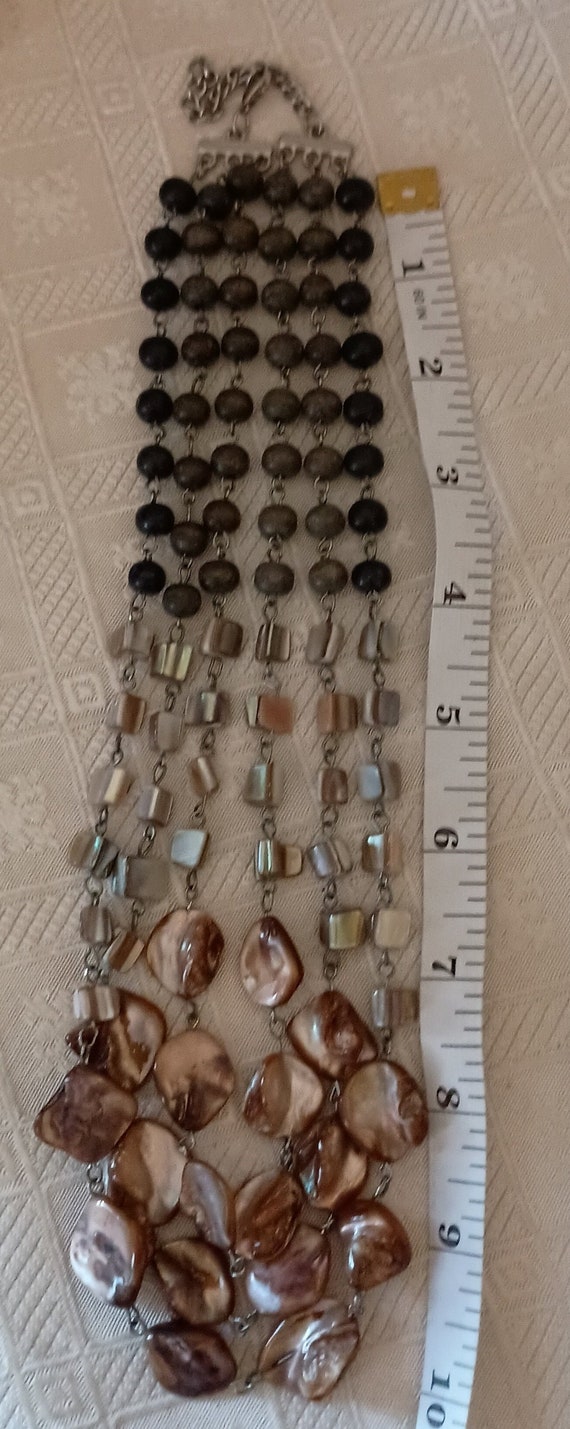 Multi strand cluster shell and beaded necklace - image 9