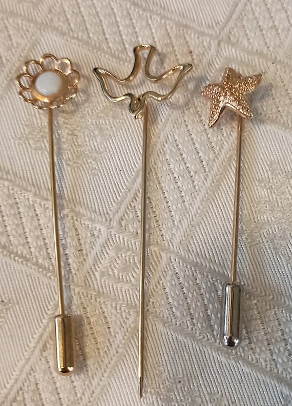 Three vintage gold tone lapel/stickpins