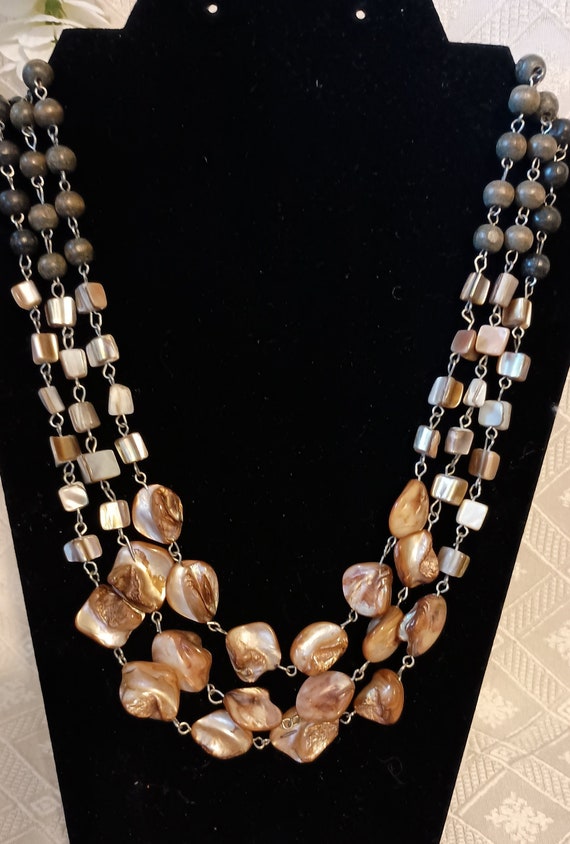 Multi strand cluster shell and beaded necklace - image 1
