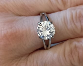 cubic zirconia silver tone earrings and ring (size 8)