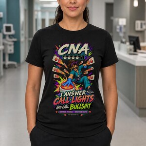 May include: A black t-shirt featuring a colorful graphic of a healthcare worker pressing a large red button. The text reads CNA, I ANSWER CALL LIGHTS AND CALL BULLSHIT, CERTIFIED PATIENCE, UNFILTERED MOUTH, and BAD DECISIONS CO. with coffee icons.