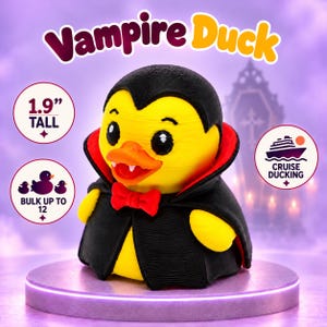 May include: A yellow rubber duck dressed as a vampire with a black cape, red lining, and a red bow tie. The duck has white fangs and black eyes. Text reads Vampire Duck, 1.9 inches tall, bulk up to 12, and cruise ducking.